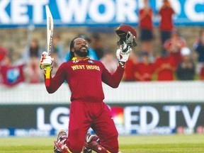 West Indies’ Chris Gayle celebrates reaching 200 runs during their match against Zimbabwe. (REUTERS)