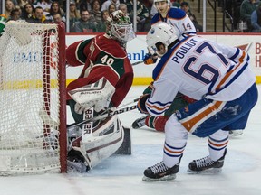 Benoit Pouliot opened scoring for the Oilers with this first-period goal Tuesday on Wild goaltender Devan Dubnyk in St. Paul, Minn. (USA TODAY SPORTS)