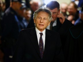 Filmmaker Roman Polanski walks on a corridor during a break of a court hearing in Krakow February 25, 2015. Polanski testified at a hearing in Poland on Wednesday regarding a U.S. request for his extradition over a 1977 child sex crime conviction, though the court said it needed more time to make a decision. REUTERS/Kacper Pempel