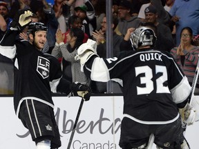 Los Angeles Kings forward Kyle Clifford (left) celebrates with  goalie Jonathan Quick after defeating the St. Louis Blues in a shootout at Staples Center. (Jayne Kamin-Oncea/USA TODAY Sports)
