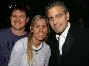 George Clooney with Leanne Smith and her husband Dan.