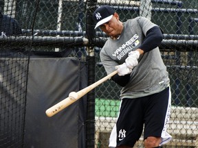 New York Yankees third baseman Alex Rodriguez makes contact during batting Wednesday at the New York Yankees minor league complex in Tampa, Fla. (Tommy Gilligan/USA TODAY Sports)