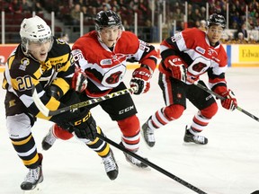 Kingston Frontenacs captain Roland McKeown, in action against the 67's in Ottawa on Feb. 15, had his NHL rights traded to the Carolina Hurricanes by the Los Angeles Kings on Wednesday. (QMI Agency)