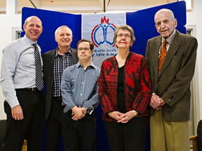 (From left) Inductees Kevin Martin, Bruce MacGregor, Joey Moss, Jean Folinsbee and David Folinsbee pose for a group photo during an announcement of inductees into the Alberta Sports Hall of Fame at Percy Page Centre in Edmonton, Alta., on Wednesday, Feb. 25, 2015. Codie McLachlan/Edmonton Sun/QMI Agency