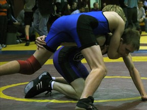 St. Mary's Warriors Austin Scott, bottom, wrestles against Parkside Collegiate Institute's Carson Thayer in the bronze medal during WOSSAA wrestling  in London Feb. 20. Thayer prevailed to capture the bronze medal.