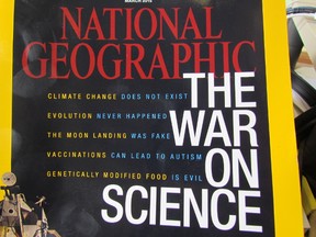 Deputy Premier Deb Matthews waved the War on Science issue of National Geographic magazine and advised the Progressive Conservatives that they had made the cover. (ANTONELLA ARTUSO/Toronto Sun)