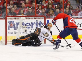 Anaheim Ducks goalie Ilya Bryzgalov makes a save on Washington Capitals right wing Troy Brouwer in the second period at Verizon Center. (Geoff Burke/USA TODAY Sports)