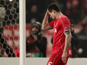 Dejan Lovren of Liverpool reacts after failing to score a penalty shot in their Europa League round of 32 second leg soccer match against Besiktas in Istanbul February 26, 2015.            REUTERS/Osman Orsal