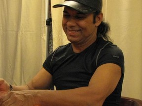 Bikram Choudhury at a book signing in New York in 2007. (Wikipedia)