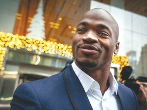 Vikings running back Adrian Peterson won his case against the NFL and has been reinstated by a district court judge. (REUTERS)