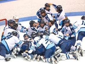 The  Lucas Vikings celebrated after defeating the Medway Cowboys in a shoot-out to win the TVRA Central hockey championship 3-2 at Thompson Arena. (DEREK RUTTAN/London Free Press)