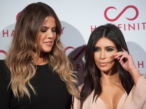 Khloe and Kim Kardashian (WENN.COM)