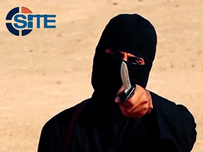 A masked, black-clad militant, who has been identified by the Washington Post newspaper as a Briton named Mohammed Emwazi, brandishes a knife in this still image from a 2014 video obtained from SITE Intel Group February 26, 2015. Investigators believe that the masked killer known as "Jihadi John", who fronted Islamic State beheading videos, is Emwazi, two U.S. government sources said on Thursday. The British government and police refused to confirm or deny his identity, which was first revealed by the Washington Post, saying it was an ongoing security investigation.  REUTERS/SITE Intel Group/Handout via Reuters