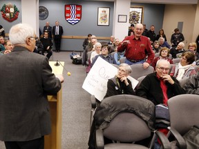 MPP of Northumberland-Quinte West Lou Rinaldi, left, takes a question from a concerned Quinte West, Ont. citizen and supporter of Trenton Memorial Hospital (TMH) during a press conference held at Quinte West city hall in Trenton, Ont. Friday, Feb. 27, 2015.  - JEROME LESSARD/THE INTELLIGENCER/QMI AGENCY