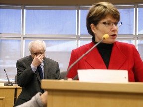 MPP of Northumberland-Quinte West Lou Rinaldi and Mary Clare Egberts, president and chief executive officer of Quinte Heath Care (QHC), confirm Trenton Memorial Hospital (TMH) is here to stay as the province announced $3.5 millions to support QHC, including TMH, during a press conference at Quinte West city hall in Trenton, Ont. Friday, Feb. 27, 2015.   - JEROME LESSARD/THE INTELLIGENCER/QMI AGENCY