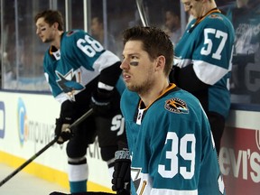 Logan Couture of the San Jose Sharks watches warm ups against the Los Angeles Kings at Levi's Stadium on February 21, 2015. (Bruce Bennett/Getty Images/AFP)