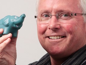 Intelligencer file photo by Luke Hendry
Garry Laws, executive director of the Mental Health Support Network of South Eastern Ontario, holds Stigma, a foam-rubber elephant, at the network's office during a campaign to erase the stigma surrounding mental health. The Ontario government, this week, announced a $28 million investment in mental health service s amalagamations.