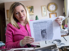 Local historian and documentary maker Justine Turner, shown here in her London home, displays a newspaper article from 1978 about her grandmother, Evelyn Johnson. The article is part of a collection of newspaper articles, photographs, and letters Turner has accumulated in her endeavour to create a documentary film about black history in London. She hopes to release the film in November. (CRAIG GLOVER, The London Free Press)