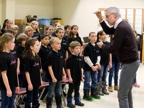 Ivars Taurins conducts the Amabile Da Capo and Treble Training Choirs in preparation of Sunday?s concert and 30th anniversary fest at Centennial Hall. (DEREK RUTTAN, London Free Press)
