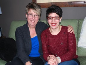 Julie Hayes, left, sits in her St. Thomas home with friend Jenny Pichette. The two met when Pichette was a high school student in St. Thomas. Pichette was born with cerebral palsy and overcame a series of obstacles to become an international motivational speaker. (Ben Forrest, Times-Journal)