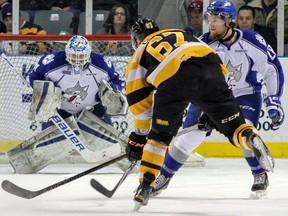 Kingston Frontenacs Lawson Crouse makes a hard shot  that is blocked by Sudbury Wolves goaltender Samuel Tanguay during the first period of Ontario Hockey League action at the Rogers K-Rock Centre in Kingston, Ont. on Friday. JULIA MCKAY/QMI Agency