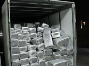 U.S. customs officers at a California border crossing seized more than 15 tons of marijuana hidden inside a tractor-trailer shipment designated as a cargo of mattresses. (cbp.gov photo)