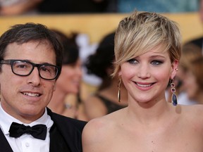 David O. Russell and Jennifer Lawrence attend the 20th Annual Screen Actors Guild (SAG) Awards in Los Angeles, Calif., on Jan. 18, 2014. (Brian To/WENN.COM)