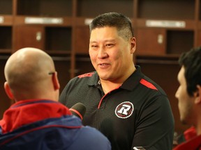 New Ottawa RedBlacks offensive line coach Bryan Chiu speaks to the media at TD Place Monday as the entire 2015 coaching staff was introduced. (Chris Hofley/Ottawa Sun)