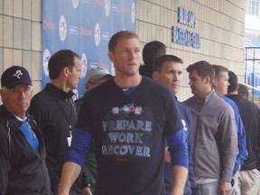 Michael Saunders looks no worse for wear a day after having 60% of his meniscus removed from his left knee. (Eddie Michels photo)