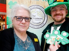 Susanne Quinlan, Gleaners Food Bank operations director, with Matthew Bewsky, kicks off Shamrocks at the Wall and the Quinte Mall in Belleville, ON., Saturday, Feb. 28, 2015. 
Emily Mountney-Lessard/Belleville Intelligencer/QMI Agency