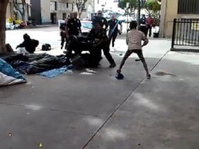 A Facebook screenshot of a shooting in downtown Los Angeles that left a homeless person dead on Sunday. (Facebook screengrab)