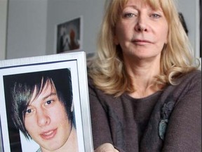 Marlene Gauthier holds a photo of her deceased son Olivier Bergevin. (QMI Agency)