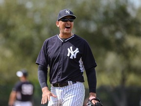 New York Yankees infielder Alex Rodriguez (13)  laughs during infield practice at Sunday mornings workout at George M. Steinbrenner Field.  (Jonathan Dyer-USA TODAY Sports)