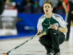 Team P.E.I. skip Adam Casey calls after a shot during the second draw of the Tim Horton's Brier at the Scotiabank Saddledome in Calgary, Alta. on Saturday, Feb. 28, 2015. The Brier runs Feb. 28 to March 8. Lyle Aspinall/Calgary Sun