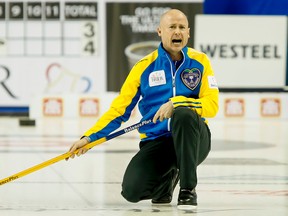 Alberta skip Kevin Koe calls a shot en route to victory over Ontario in the evening draw on Day 2 of the Tim Horton's Brier at the Scotiabank Saddledome in Calgary, Alta. on Sunday, March 1, 2015. The Brier runs Feb. 28 to March 8. Lyle Aspinall/Calgary Sun