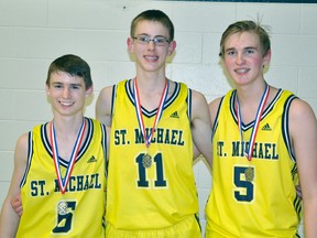 St. Michael junior boys basketball team finished with an overall record of 31-1, winning three of the four tournaments they entered, plus the Huron-Perth championship as well as the WOSSAA 'AA' title. Three players on the 13-member roster reside in Mitchell – Michael Visser (left), Kevin Rops and Ryan Bader.