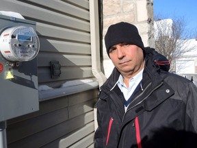 Hydro-Quebec customer Adberrahim El Masnaoui says he is being overcharged for electricity since a smart meter was installed. (ANNE CAROLINE DESPLANQUES/QMI Agency)