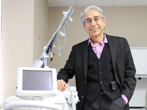 Dr. Khalid Al-Saddon stands with one of the pieces of equipment at his soon-to-open Sarnia Anti-Aging Clinic. (TYLER KULA/THE OBSERVER)