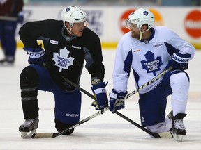 Dion Phaneuf and Phil Kessel (QMI Agency file photo)