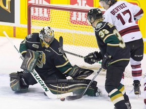 Tyler Bertuzzi of the Guelph Storm is unable to shove a rebound past London Knights goalie Tyler Parsons during their OHL hockey game  in London, Ontario on Friday, February 27, 2015. (DEREK RUTTAN, The London Free Press)