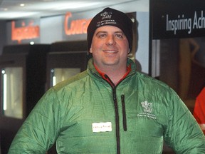 Tour manager Francois Grenier is all smiles at the It's An Honour exhibit in Dresden on Monday, Feb. 23. The exhibit, which has been travelling across Canada since the summer of 2013, howcases stories of great Canadians who have been recognized for their extraordinary achievements with national honours.