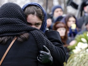 Zhanna, daughter of Russian leading opposition figure Boris Nemtsov, reacts during his funeral in Moscow, Mar. 3, 2015. (REUTERS/Tatyana Makeyeva)
