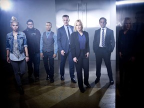 The "CSI: Cyber" team, with Patricia Arquette, second right.