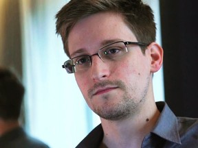 NSA whistleblower Edward Snowden, an analyst with a U.S. defence contractor, is seen in this file still image taken from video during an interview by The Guardian in his hotel room in Hong Kong June 6, 2013. REUTERS/Glenn Greenwald/Laura Poitras/Courtesy of The Guardian/Handout