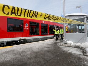Two trains sit at the Trillium Line stop at Carleton University in Ottawa Tuesday March 3, 2015. A malfunction on Tuesday morning shut down the line, which was reopened after a major upgrade on Monday. (Tony Caldwell/Ottawa Sun)