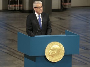 A photo taken on December 10, 2013 shows Nobel Committee chairman Thorbjoern Jagland delivering his speech at the start of the Nobel Peace Prize award ceremony at the Oslo City Hall. The Norwegian Nobel Peace Prize Committee removed Jagland as chairman and named  committee member Kaci Kullmann Five to replace him, on March 3, 2015. 
AFP PHOTO / DANIEL SANNUM LAUTEN/Files