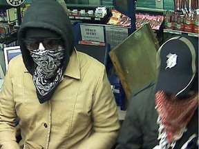 Ottawa cops are hunting these two suspects in a Feb. 14 gas bar robbery on Baseline Rd. near Pinecrest Rd. (OTTAWA POLICE submitted image)