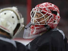 Ottawa Senators Andrew Hammond and Robin Lehner during practice at the Canadian Tire Centre in Ottawa Friday Jan. 30 2015.  Tony Caldwell/Ottawa Sun/QMI Agency