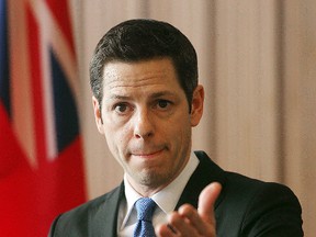 Mayor Brian Bowman gestures while speaking with the media after tabling the 2015 civic budget in Winnipeg, Man. Tuesday March 3, 2015.