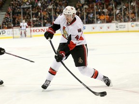 ANAHEIM, CA - FEBRUARY 25: Patrick Wiercioch #46 of the Ottawa Senators takes a shot against the Anaheim Ducks at Honda Center on February 25, 2015 in Anaheim, California.   Stephen Dunn/Getty Images/AFP== FOR NEWSPAPERS, INTERNET, TELCOS & TELEVISION USE ONLY ==